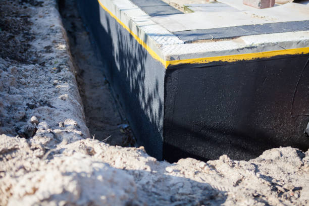 Professional Interior Drainage System technician working in Nevada, OH